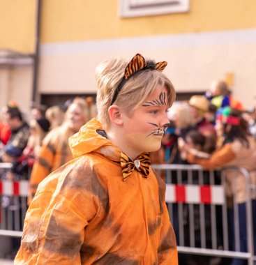 Villach, Austria - 2023 February 19: Carnival in Villach, Fasching, Participants in the annual parade wear colorful and masquerade clothing. Motto: Lei-Lei.