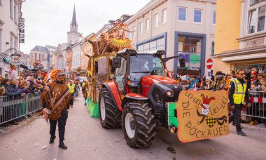 Villach, Austria - 2023 February 19: Carnival in Villach, Fasching, Participants in the annual parade wear colorful and masquerade clothing. Motto: Lei-Lei.