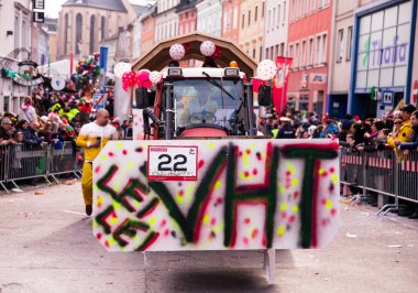 Villach, Austria - 2023 February 19: Carnival in Villach, Fasching, Participants in the annual parade wear colorful and masquerade clothing. Motto: Lei-Lei.