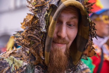 Villach, Austria - 2023 February 19: Carnival in Villach, Fasching, Participants in the annual parade wear colorful and masquerade clothing. Motto: Lei-Lei.