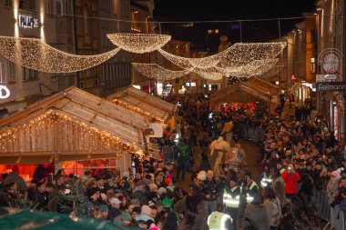 Villach, Austria - 11.29.2024: Processions of the terrible Krampus at the famous Krampuslauf in Villach clipart