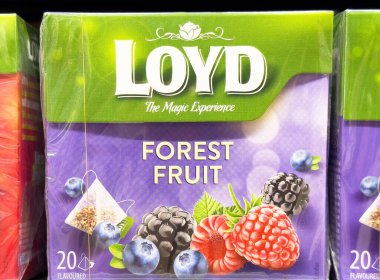 Loyd forest fruit tea packaging with mixed berries. clipart