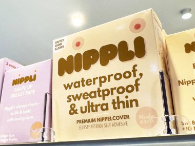 Nipple covers packaging displayed on shelf in store. clipart