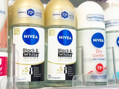 Variety of nivea antiperspirants on display in store. clipart