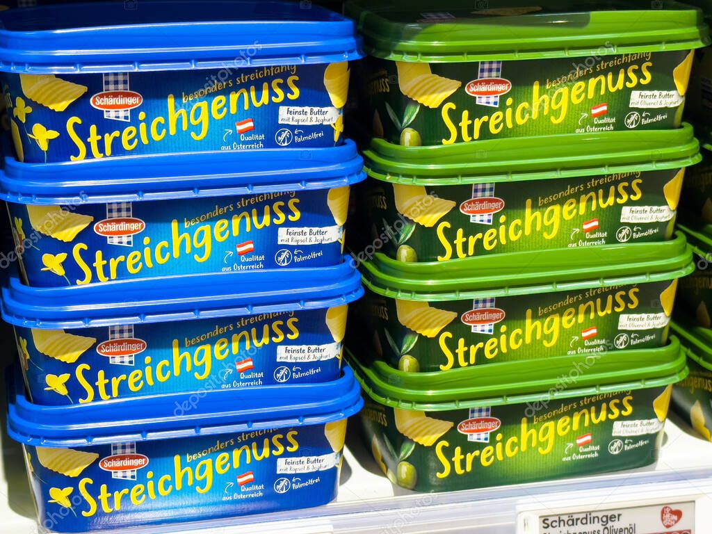 Austrian streichgenuss butter tubs in supermarket display.