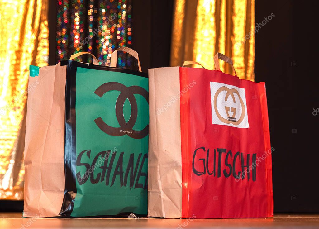 Parody shopping bags: humor and fashion fusion with sparkling background.
