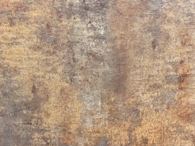 Eskimiş desenli kahverengi ve gri taş yüzey.