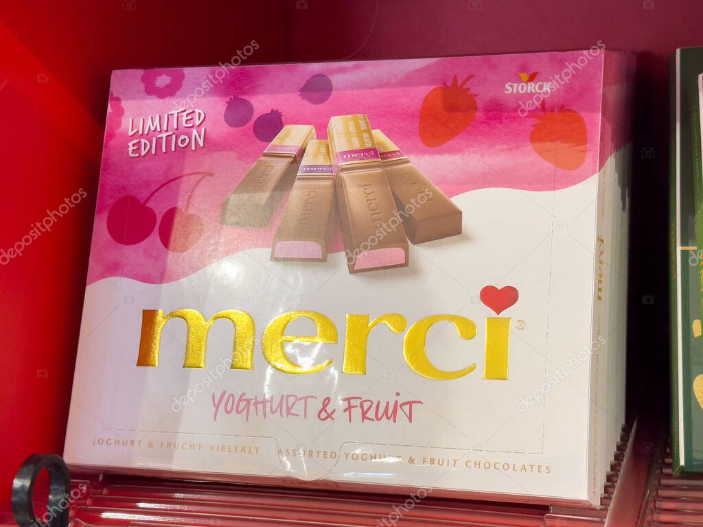 Limited edition merci yogurt and fruit chocolates in vibrant packaging.