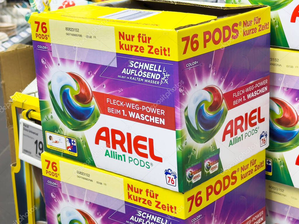 Ariel all-in-1 pods packaging for laundry detergent display in supermarket.