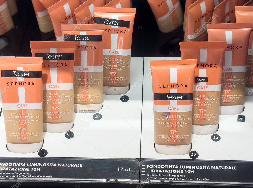 Sephora care foundation tester display with pricing and description in store setting.