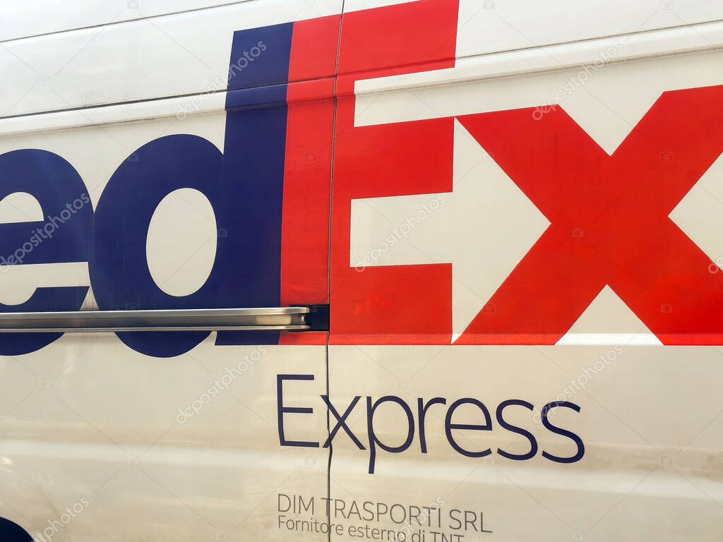 Fedex express delivery van with company logo and branding.