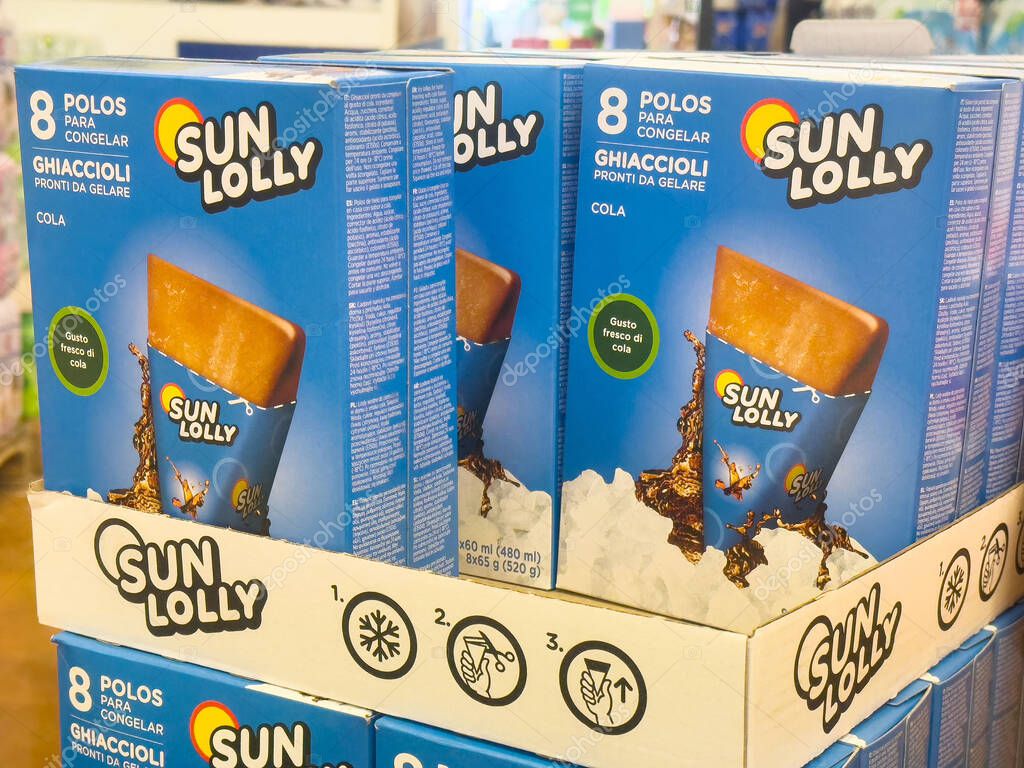 Sun lolly cola ice pops display in supermarket.