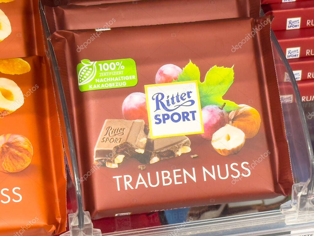 Ritter sport trauben nuss chocolate with grapes and nuts in brown packaging.