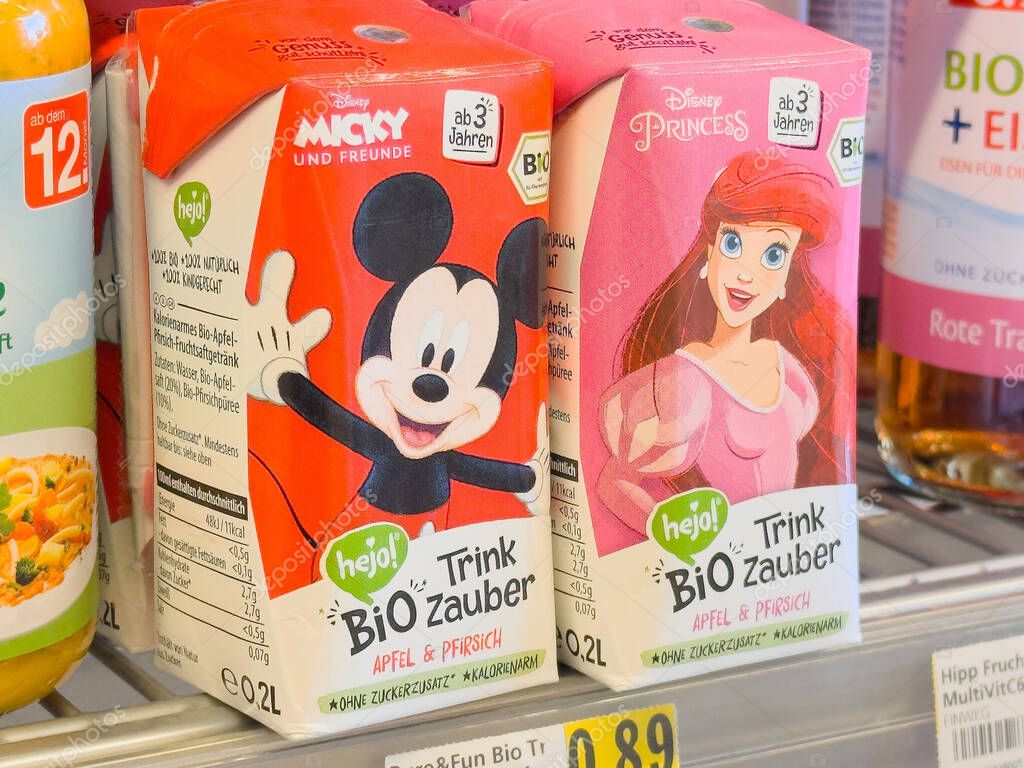 Disney juice boxes with mickey mouse and princess ariel for children.