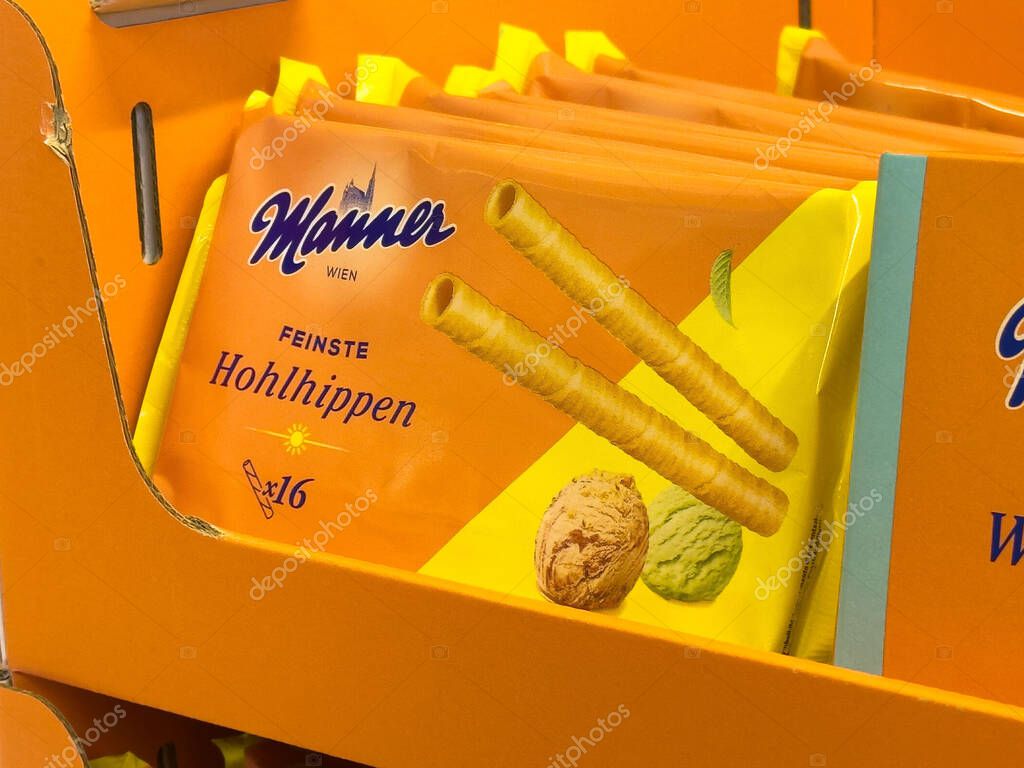 Manner hohlhippen hazelnut wafer packaging displayed in store.