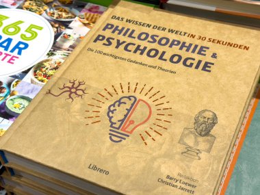 Villach, Austria - September 28, 2025: Book cover on philosophy and psychology, highlighting key concepts with brain illustration and classical figure, perfect for educational use