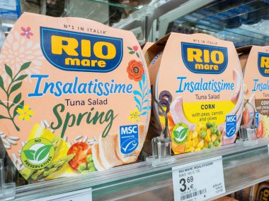 Villach, Austria - September 28, 2025: RIO Mare Insalatissime Spring Tuna Salad packaging is prominently displayed in a supermarket, highlighting freshness and quality