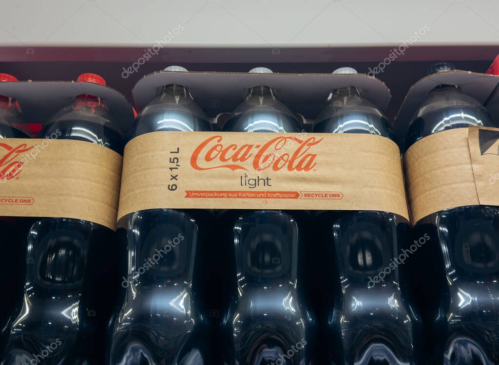 Villach, Austria - September 28, 2025: Six-pack of Coca-Cola Light bottles displayed on a shelf, highlighting the recognizable branding and packaging style