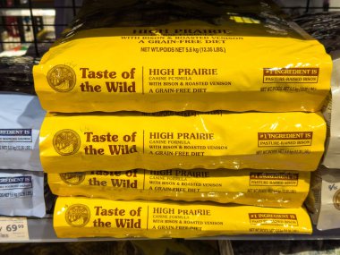 Ljubljana, Slovenia - October 02, 2025: Taste of the Wild High Prairie dog food bags displayed on a retail shelf, featuring bison and roasted venison ingredients for dogs