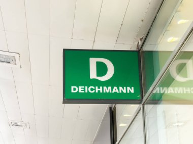 Ljubljana, Slovenia - October 02, 2025: Deichmann brand sign is visible in a bustling shopping district, highlighting its recognizable logo and inviting atmosphere