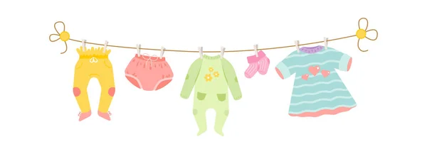 赤ん坊の服はロープで乾く ベクターイラスト — ストックベクタ