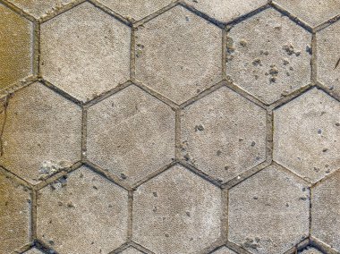 Deniz kenarındaki eski kaldırım taşları bal peteği şeklinde. Geçmişi. Yüksek kalite fotoğraf