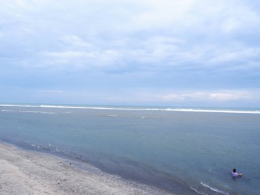 Beautiful tropical beach with blue sky and white clouds abstract texture background. Vintage tone filter effect color style.Nature tropical beach sea. Beautiful beach blue sea water. Blue sky background. .Beach space area