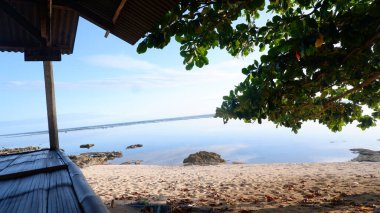 Beautiful tropical beach with blue sky and white clouds abstract texture background. Vintage tone filter effect color style.Nature tropical beach sea. Beautiful beach blue sea water. Blue sky background. .Beach space area