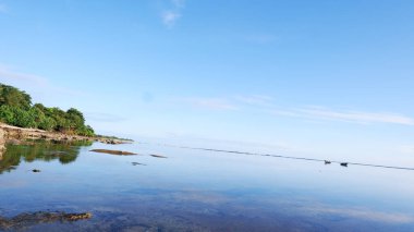 Blue beach view, blue sky, island and gorgeous green trees on tropical beach, Panoramic view. Vintage tone filter effect color style. Nature tropical beach sea.