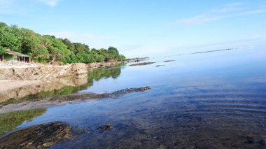 Blue beach view, blue sky, island and gorgeous green trees on tropical beach, Panoramic view. Vintage tone filter effect color style. Nature tropical beach sea.