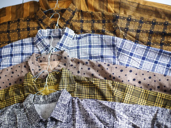 Colorful shirts lined up neatly. Shirt Shop, Abstrac Shirt, Polka dot Shirt