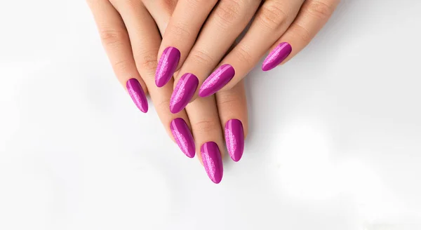 Manicure: Beautifully Manicured Woman\'s Nails with Pink Glitter Nail Polish