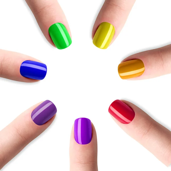Rainbow manicure, seven color nail polish. Natural shapes