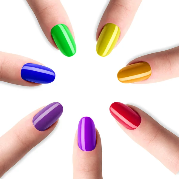 Rainbow manicure, seven color nail polish. Oval shapes