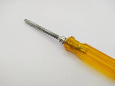 Screwdriver with orange handle colour isolated on white background