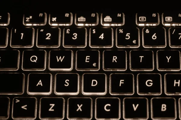Detail Backlit Keyboard Asus Laptop Sepia Effect — стокове фото