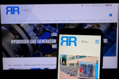 Akıllı telefonun ön planında, Milan Borsasında Euronext Growth Milan segmentinde yer alan bir İtalyan şirketi olan ErreDue spa 'nın logosu yer alıyor. Kalbin adı RDUE. Şirket hidrojen ve oksijen gibi gazlar üretmek için makineler geliştirir..