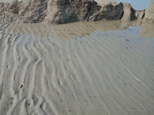 Zblízka Textura Mořské Vody Plážový Písek Skály Pozadí Přírody — Stock fotografie