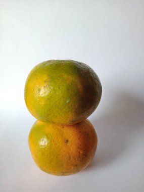 sweet orange fruit (citrus) yellowish orange. White isolated background