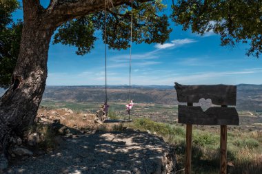 Cork oak swing in Castedo, Torre de Moncorvo, Portugal