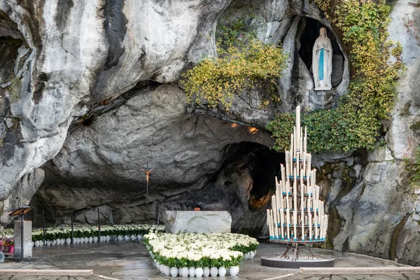 stock image Grotto of the Apparition where Our Lady appeared to Bernadette Soubirous in the Sanctuary of Lourdes in the city of the Pyrenees, France