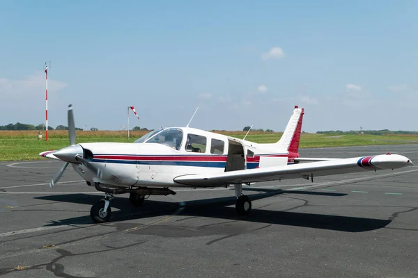 stock image Small plane parked on runway ready and prepared for skydiving