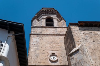 Bell tower of the Church of Saint John the Baptist in Saint Juan de Luz in the French Basque Country: An icon of charm and history clipart