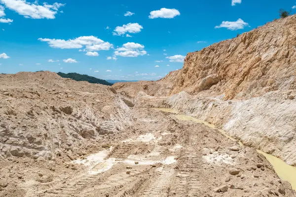 stock image Open pit mining: Land excavated after mineral extraction in an industrial quarry
