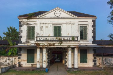 Surakarta - Indonesia, January 16, 2025 : Kavallerie-Artillerie Building at Mangkunegaran Palace. The function of the building was formerly the headquarters of the Mangkunegaran Legion clipart