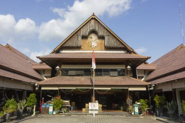 Surakarta - Indonesia, January 14, 2025 : View of Triwindu Ngarsopuro market or called Pasar Triwindu for anyone who wants to buy antique stuff, located on Surakarta clipart