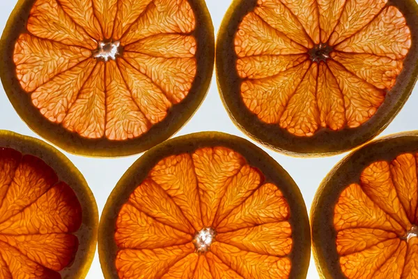 sliced orange slices on a white background
