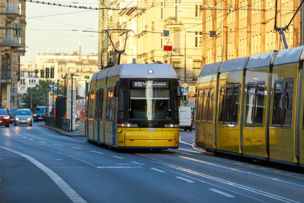 stock image Berlin, Germany - October 7, 2022: Yellow tram drives along a street. The Berlin tramway (German: Strassenbahn Berlin) is the main tram system in Berlin, Germany.