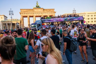Berlin, Berlin/Germany - July 08.2023: Rave the Planet parade in Berlin. Rave the Planet is an electronic dance music festival and technoparade. clipart