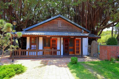 Anping Ağaç Evi, Gubao Caddesi, Anping Bölgesi, Tainan, Tayvan 'da banyan ağaçlarıyla kaplanmış eski bir depo.